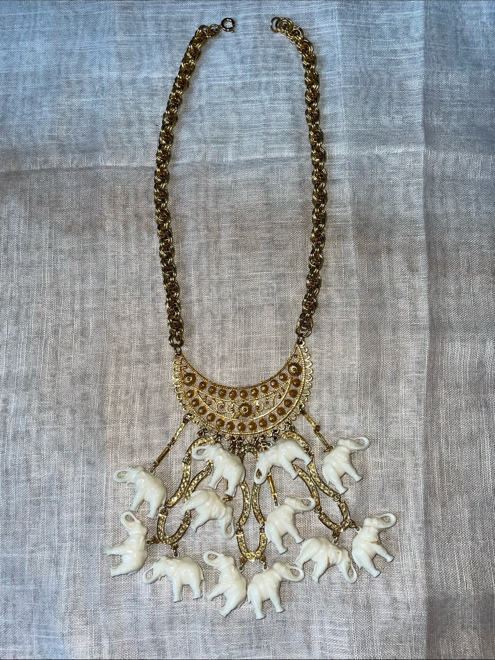 Bohemian Gold Statement Necklace with White Elephant Charms. 16”.